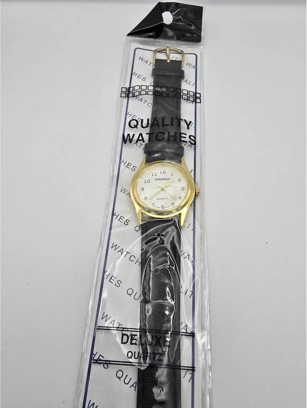 Persopolis Quartz Watch Gold Tone Case Cream Dial Luminous Hands Black Strap
